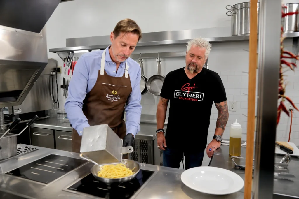 Federico Perandin cooking with Guy Fieri